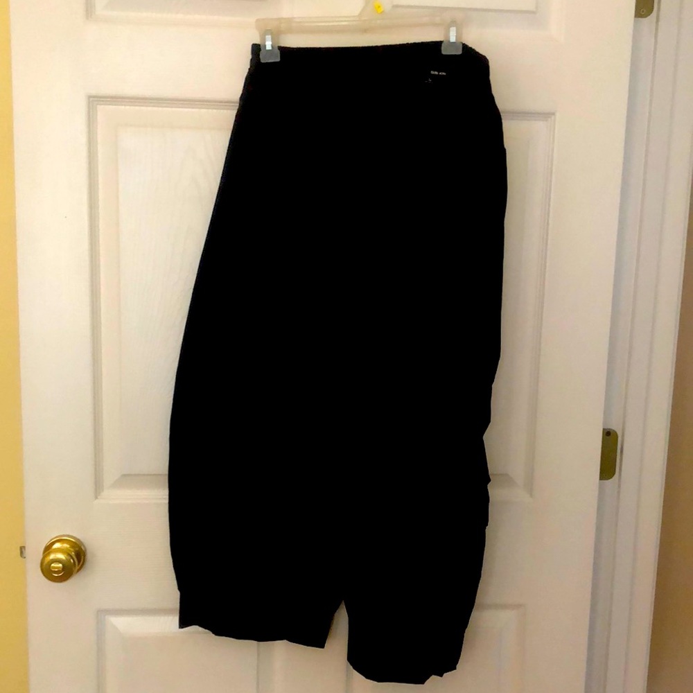 Black taffeta pants.